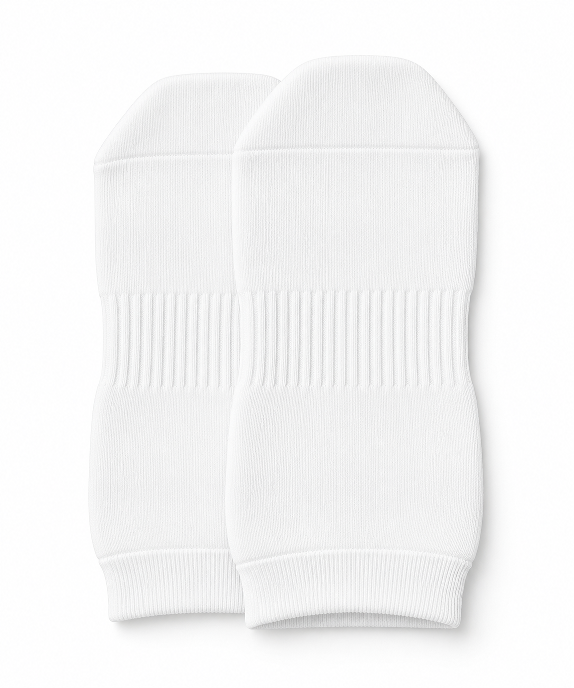 Paire de chaussettes antidérapantes blanches pour trampoline et yoga, vue de dessus